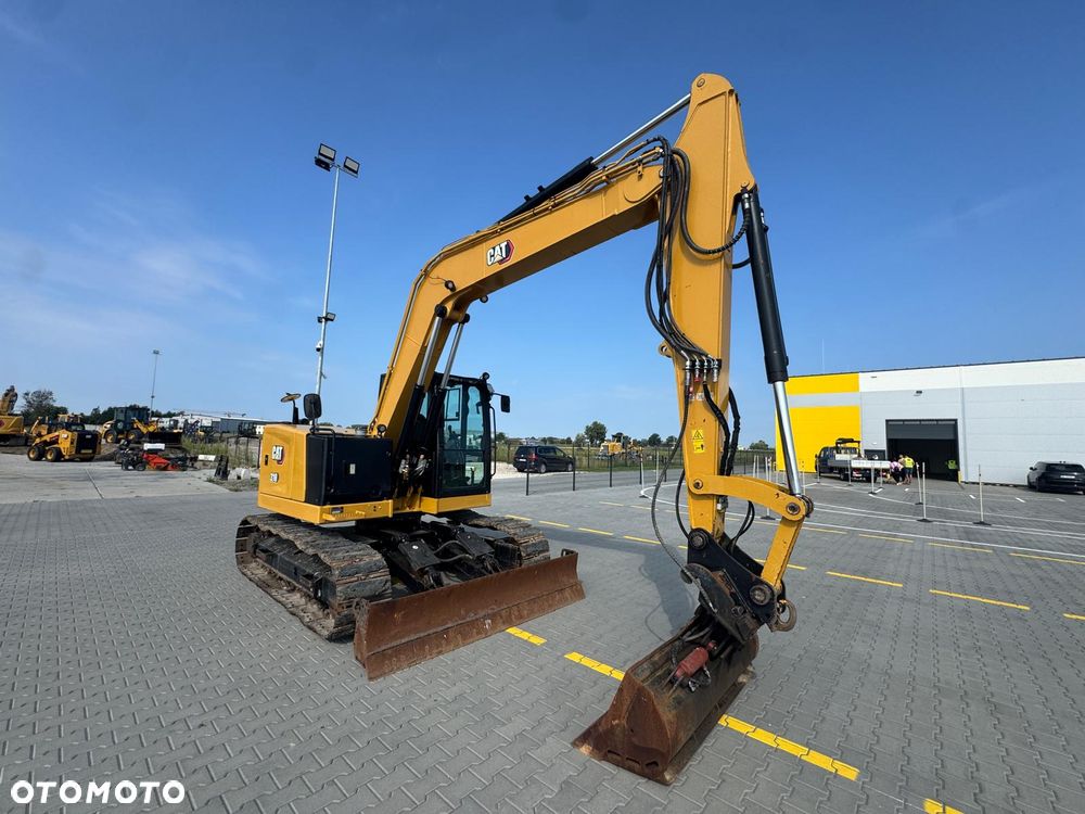 Caterpillar 310 - 1