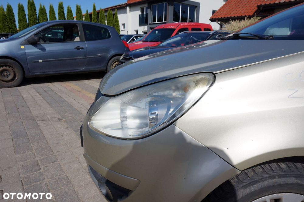 MASKA ZDERZAK BŁOTNIKI LAMPY CORSA D IV Z40M  OPEL 2006-2011 ZŁOTY PRZÓD KOMPLETNY - 33