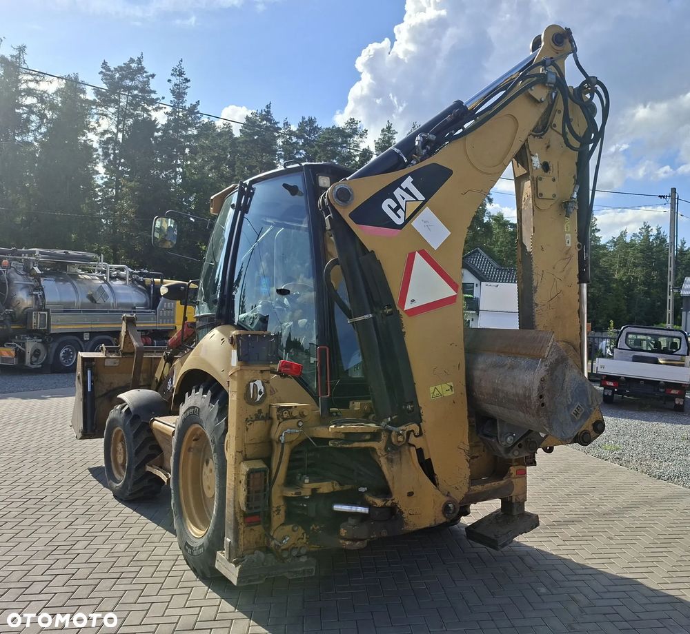 Caterpillar 428E - 7