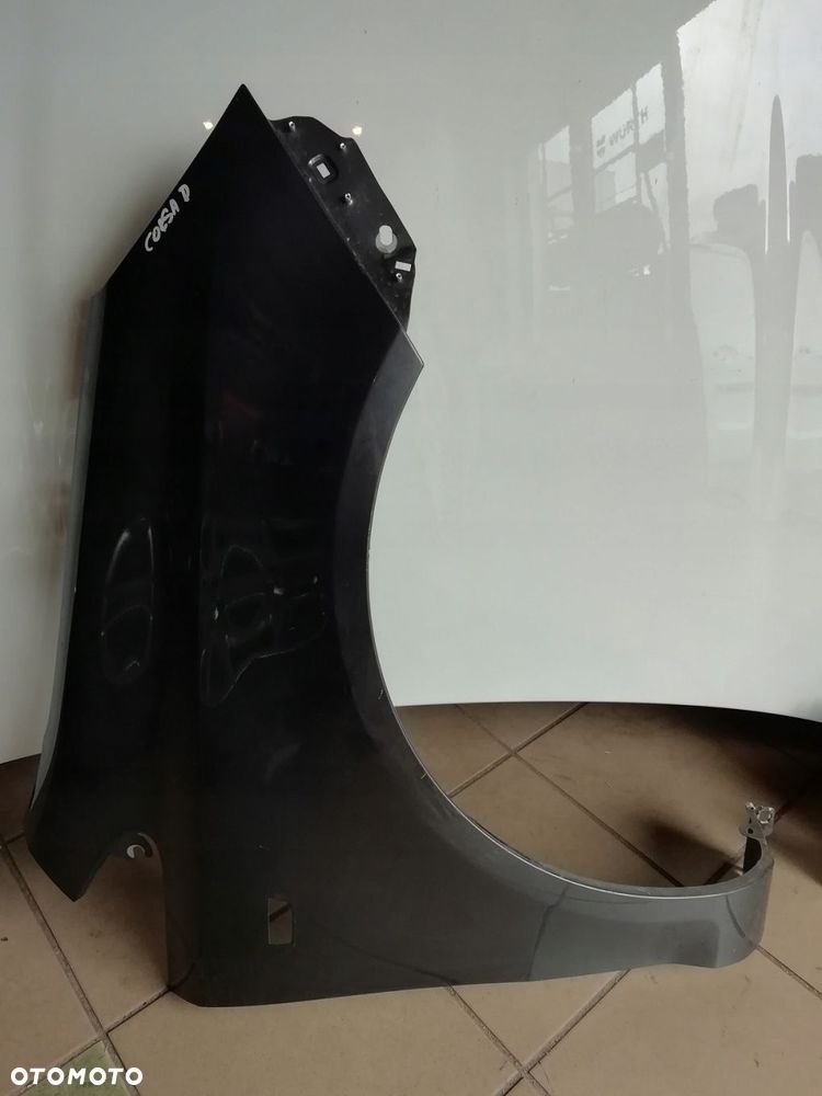 Błotnik przód przedni prawy Opel Corsa D - 1