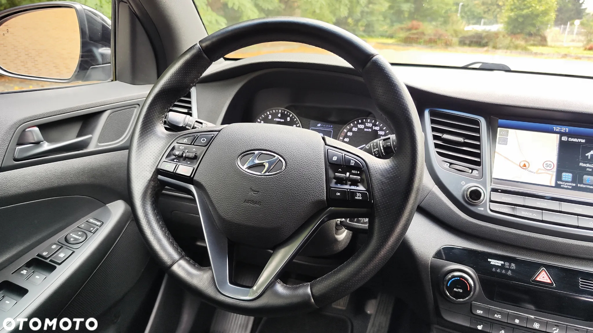 Hyundai Tucson blue 1.6 GDi 2WD Passion - 31