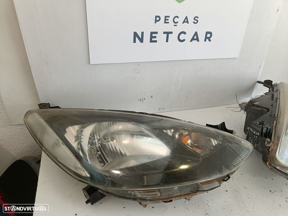 Farol optica Mazda 2 2009 - 3