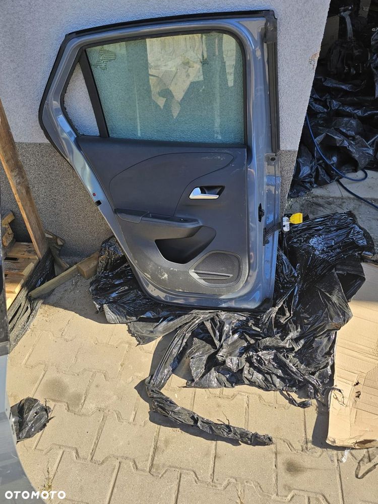 drzwi tylne lewe lewy tył opel corsa f - 2