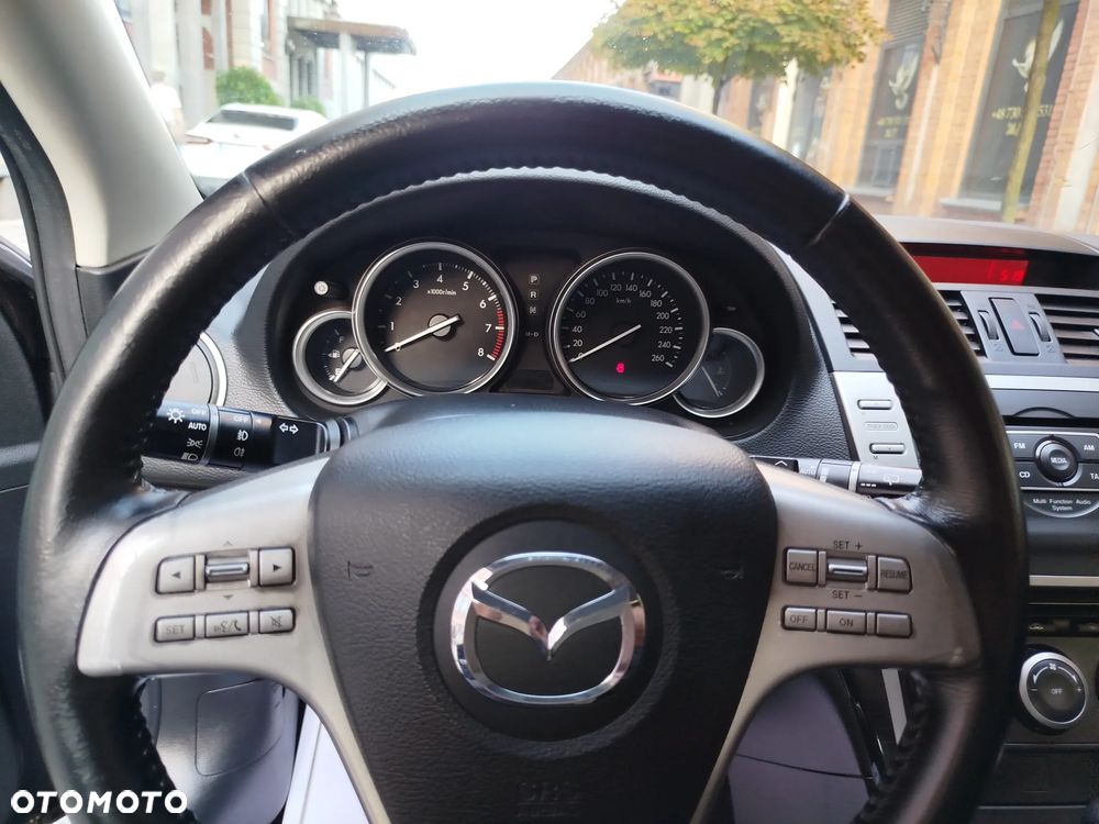 Mazda 3 2.0 Exclusive + - 16