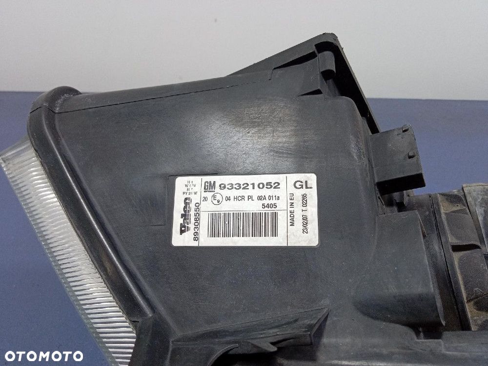 OPEL MERIVA A REFLEKTOR LEWY LAMPA EU 93321052 - 6