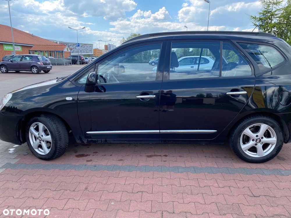 Kia Carens - 4
