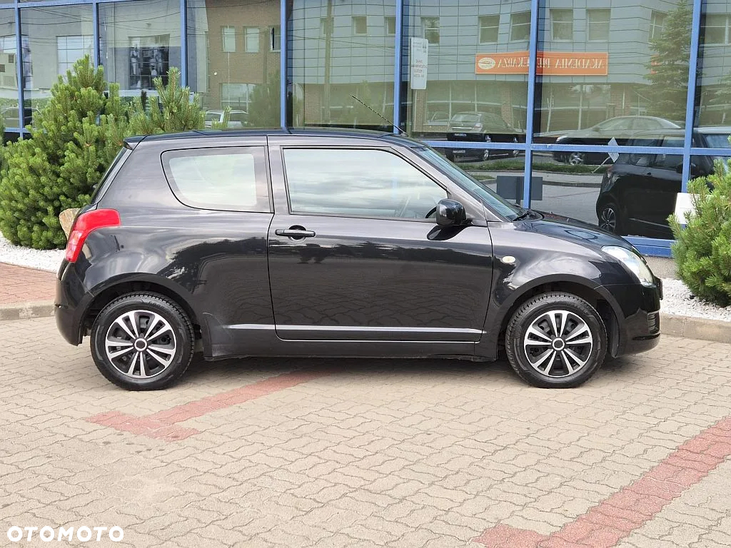 Suzuki Swift 1.3 Club - 11