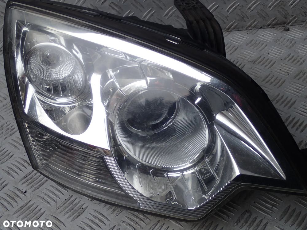LAMPA XENON PRAWY PRZÓD OPEL ANTARA - 3