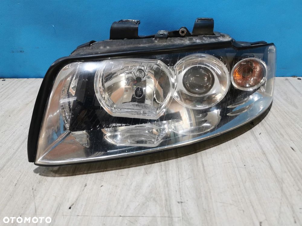Audi A4 B6 lampa reflektor lewa przód Europa - 1
