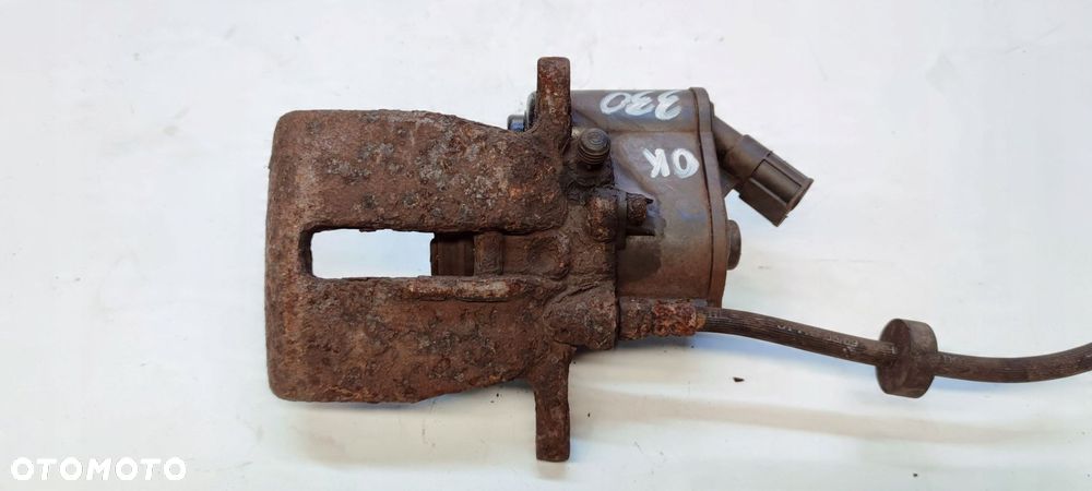 ZACISK HAMULCOWY LEWY TYŁ AUDI A6 C6 330MM ZĄBEK - 4