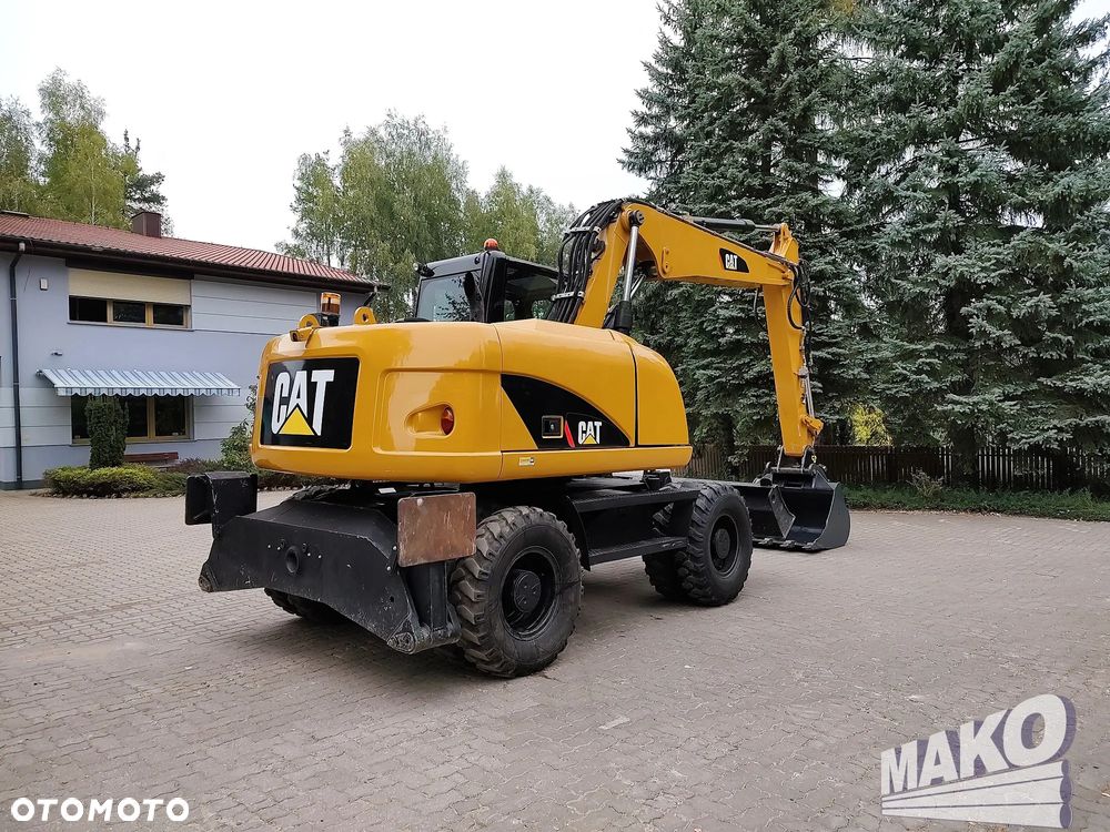 Caterpillar M313D - 4