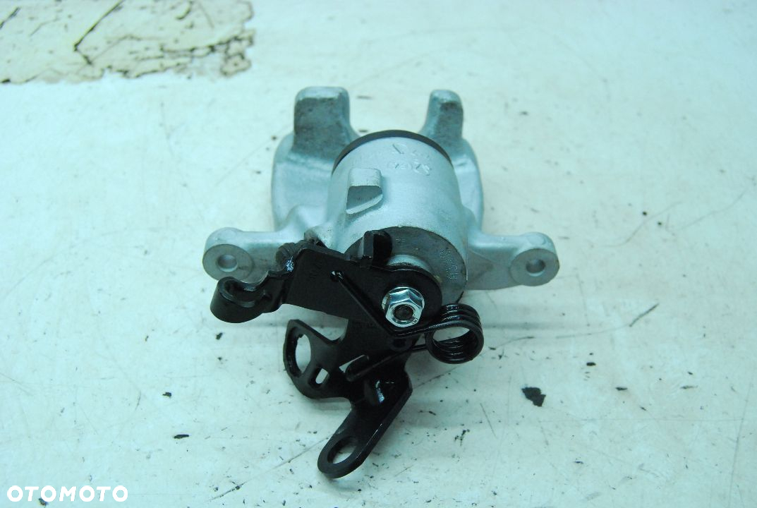 ZACISK HAMULCOWY PRAWY TYŁ REGENEROWANY VW GOLF VI TRW 1K0406BN AUDI SEAT SKODA - 4