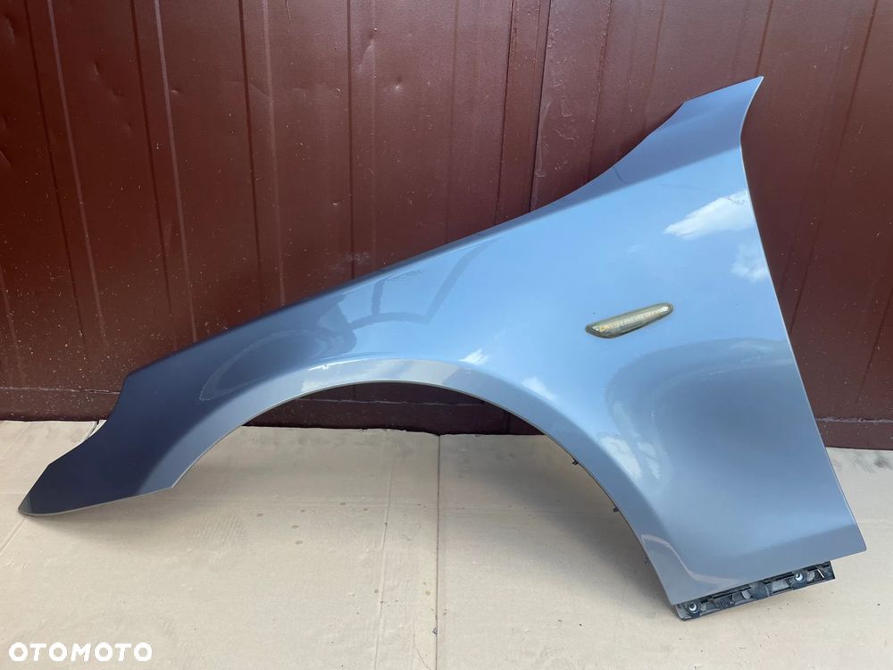 BŁOTNIK lewy  bmw e60 e61 oryginał w kolor 52/7 spacegrau met.