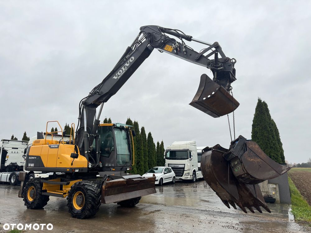 Volvo EW160D KOPARKA KOŁOWA // PODPORY PŁUG / LEMIESZ // 4 ŁYŻKI - 1