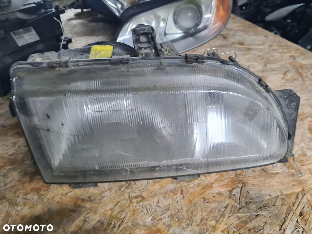 reflektor lampa prawa przód 92gg-13n010-aa ford scorpio - 1