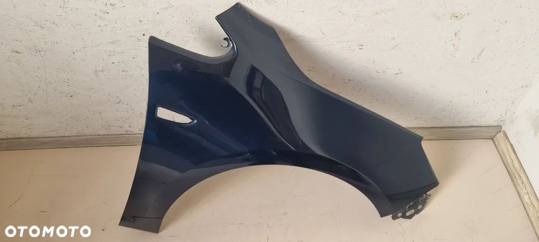 Błotnik przód prawy OPEL ASTRA J IV 4 - 1