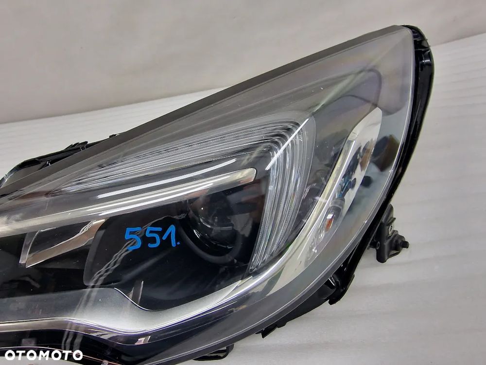 OPEL ASTRA V K 5 15- LEWA SOCZEWKA ZWYKŁA NR 39077800 , NR AUKCJI LL551 - 6