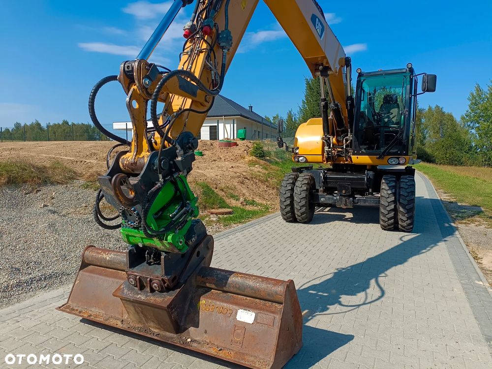 Caterpillar M313D - 11