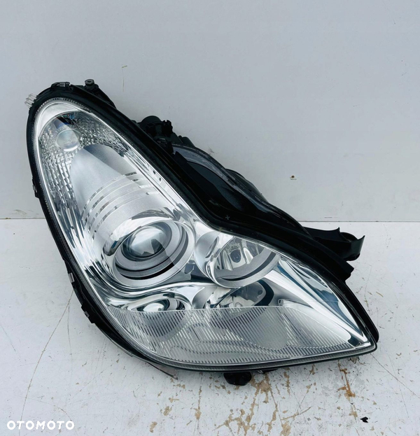 LAMPA PRAWA REFLEKTOR PRAWY MERCEDES W219 BI XENON SRKĘTNY  SPRYSKIWACZ