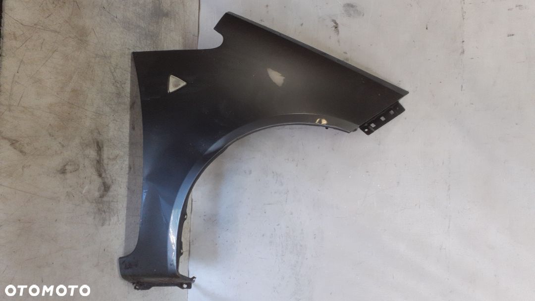 * MITSUBISHI COLT VI  BŁOTNIK PRZEDNI PRAWY SZARY U63 - 1