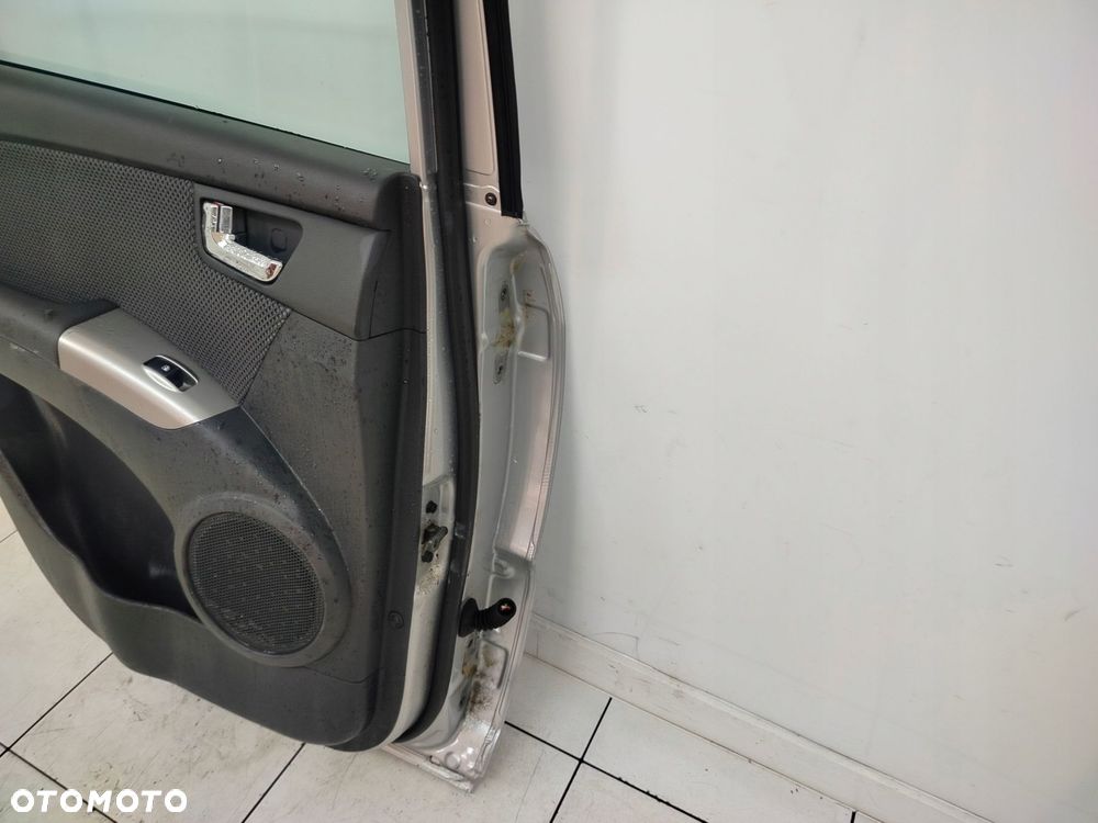kia sportage ii 04r- drzwi lewe tylne lewy tył 9s - 11