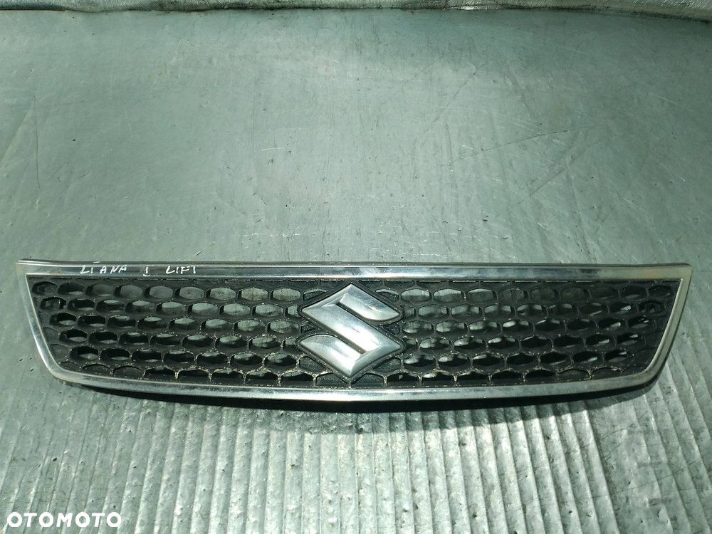 ATRAPA GRILL GRIL SUZUKI LIANA 72111-59J00 - 1