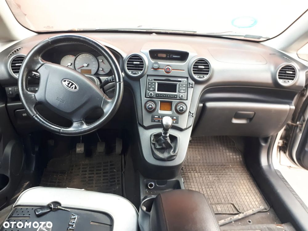 KIA CARENS III 06-11 KLAPKA WLEWU PALIWA 7S - 27