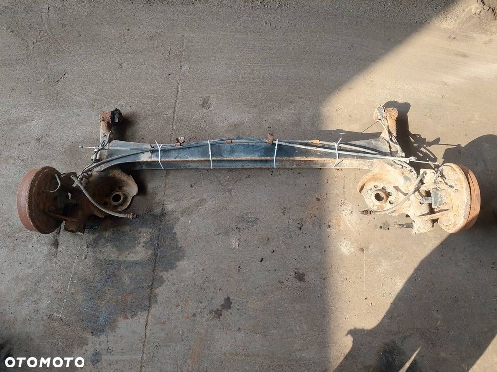 BELKA OŚ ZAWIESZENIA TYŁ BĘBNY Z ABS TOYOTA YARIS I ID: 238000 - 3