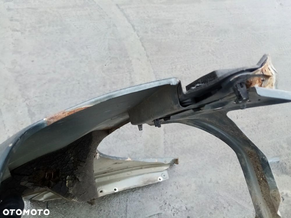 VOLKSWAGEN CADDY 03 - 10 - BLOTNIK PRZÓD LEWY - 4