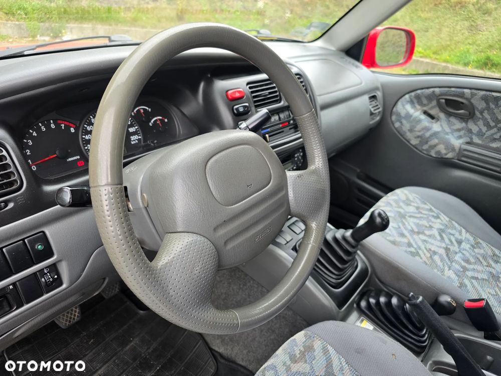 Suzuki Grand Vitara 2.0 - 7