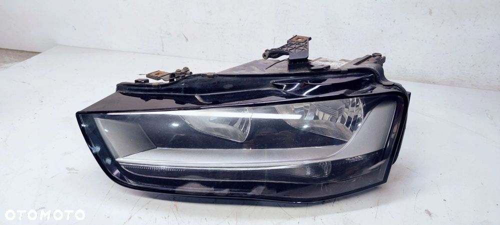 REFLEKTOR LEWY AUDI A4 B8 LIFT UK 8K0941003M - 1