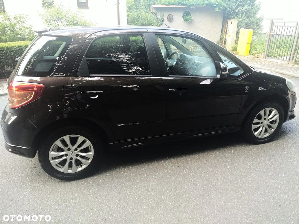 Suzuki SX4 1.6 Comfort Plus - 13