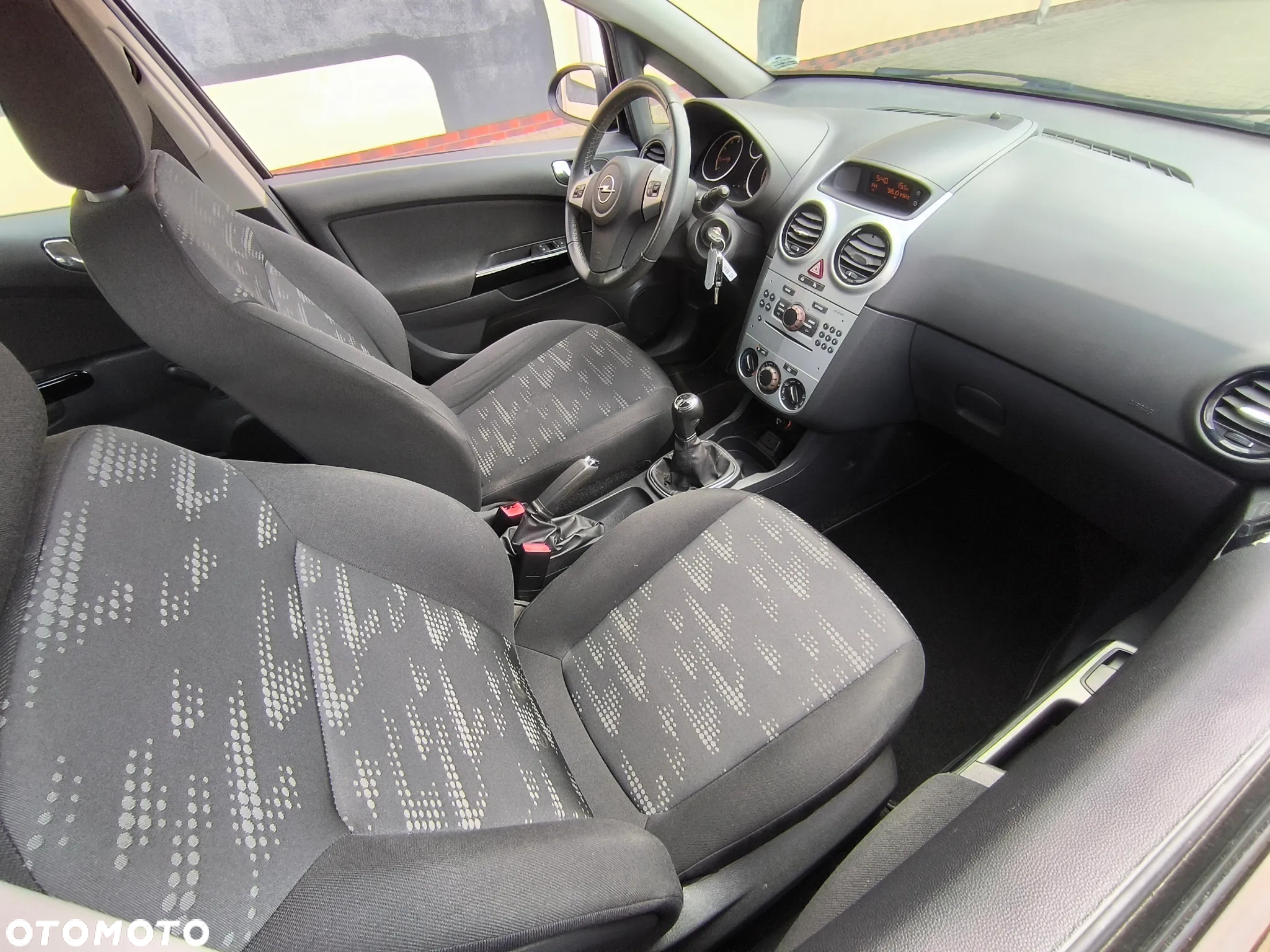 Opel Corsa 1.2 16V Enjoy - 19