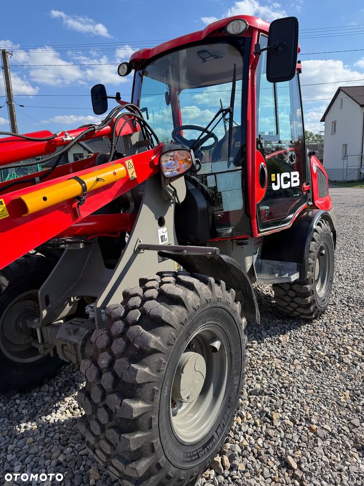 JCB 406 - 9