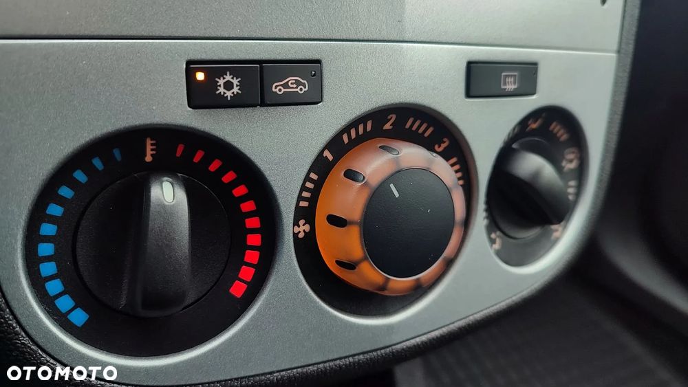 Opel Corsa 1.2 16V Enjoy - 24