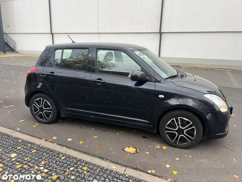 Suzuki Swift 1.3 Club - 6
