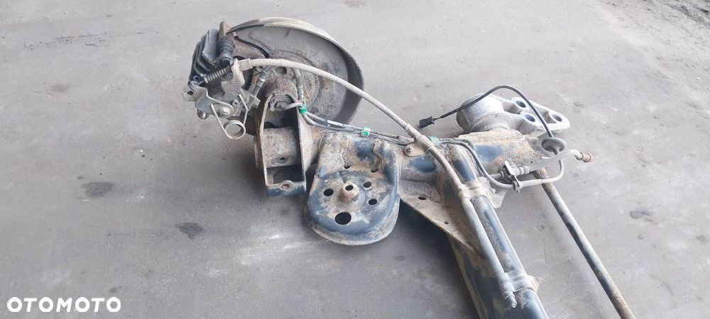 BELKA OŚ ZAWIESZENIA TYŁ TARCZE Z ABS HAMULCE ZACISKI SKODA SUPERB I - 3