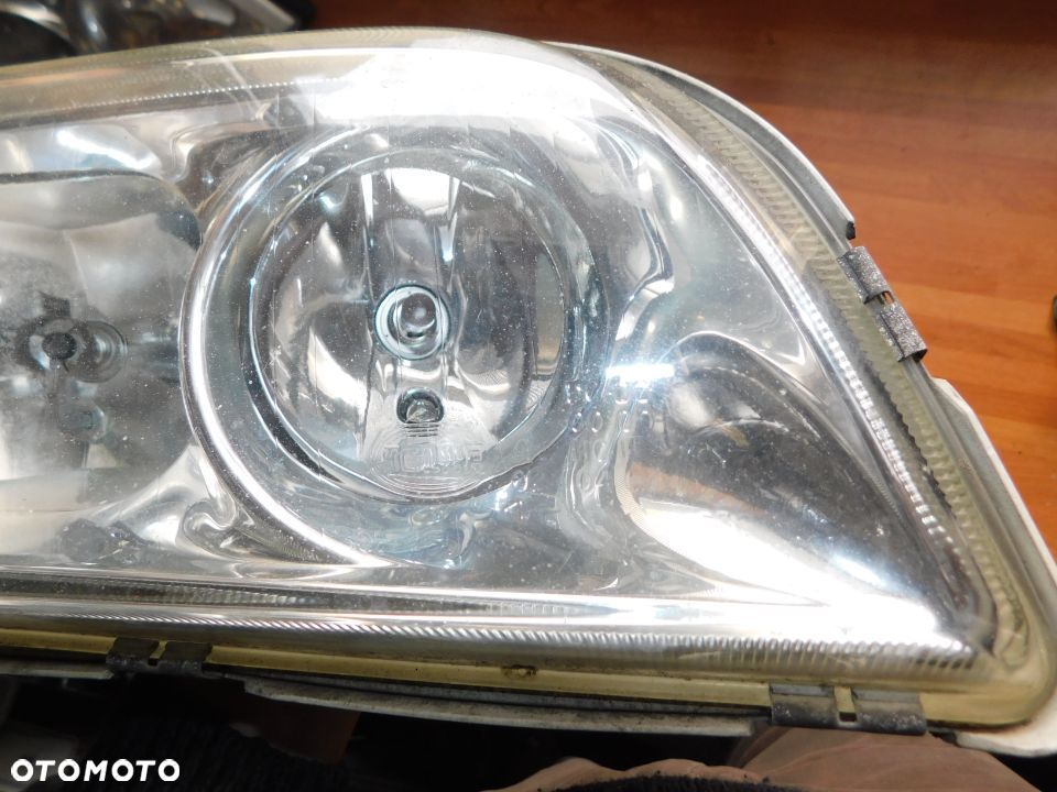 lampa prawa przód VOLVO S40 V40 99-04 lift EUROPA HELLA - 6