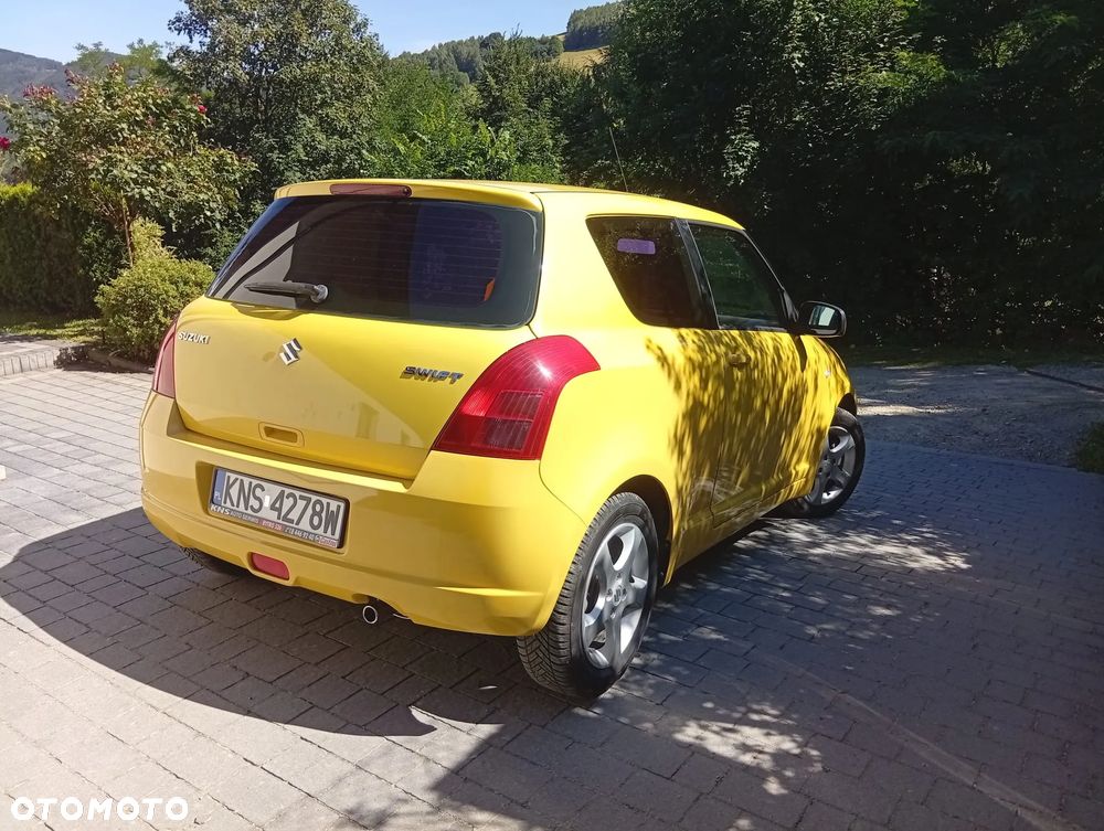 Suzuki Swift 1.3 Club - 3