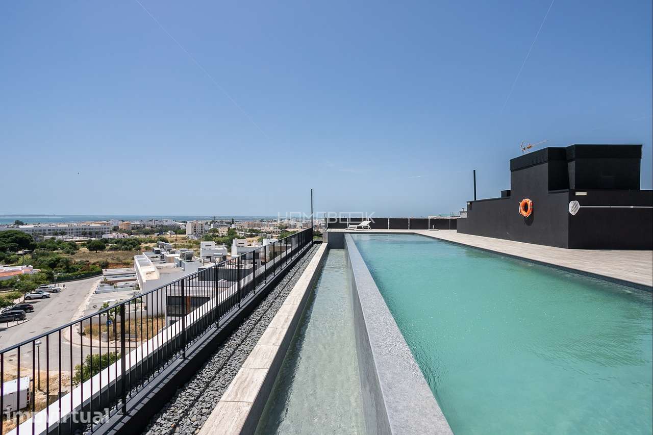 Apartamento Novo T2 - Último andar - Piscina Rooftop e Garagem - Grande imagem: 4/38