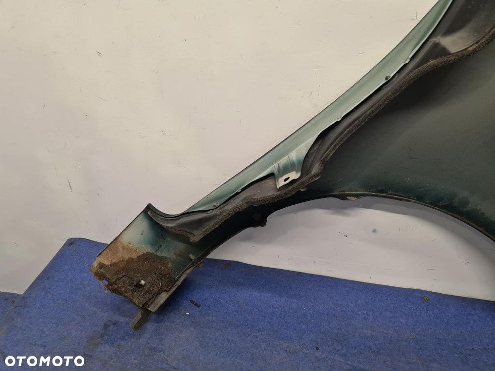 TOYOTA YARIS II LIFT BŁOTNIK PRZÓD LEWY 6S3 - 11