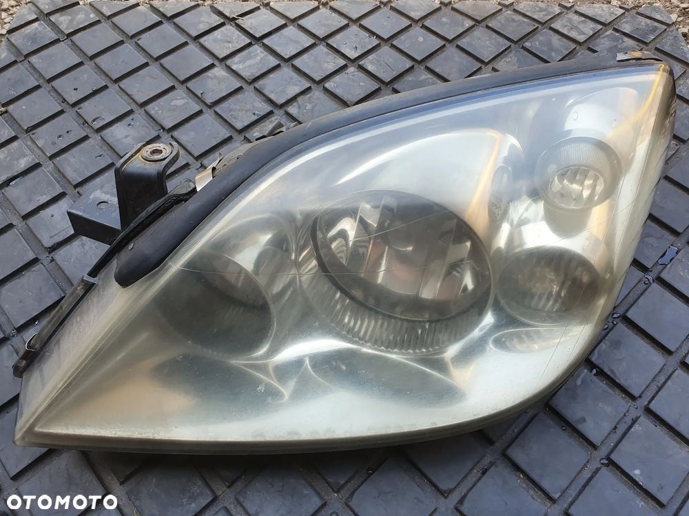 LAMPA PRZEDNIA LEWA  NISSAN PRIMERA P12 26060AU800EUROPA - 1