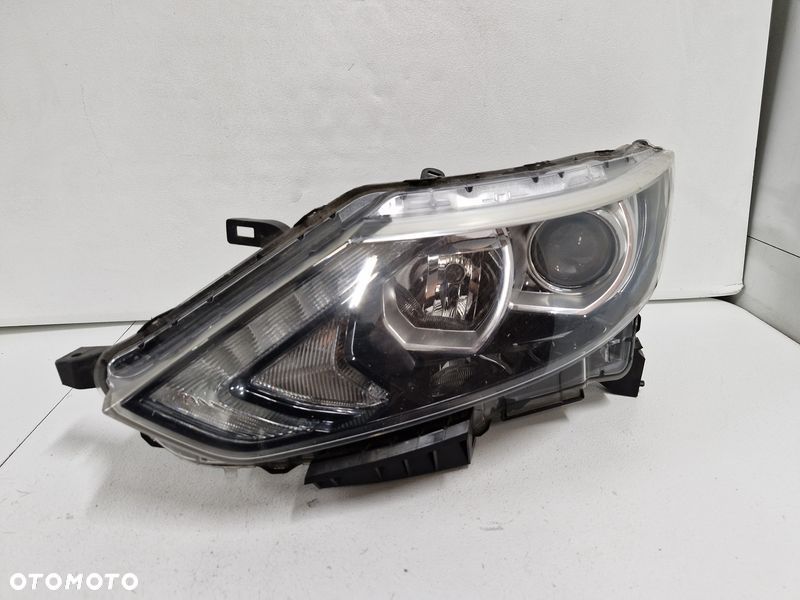 NISSAN QASHQAI 2 II J11 LAMPA LEWY PRZÓD LEWA PRZEDNIA SOCZEWKA UK 100-18014 - 1