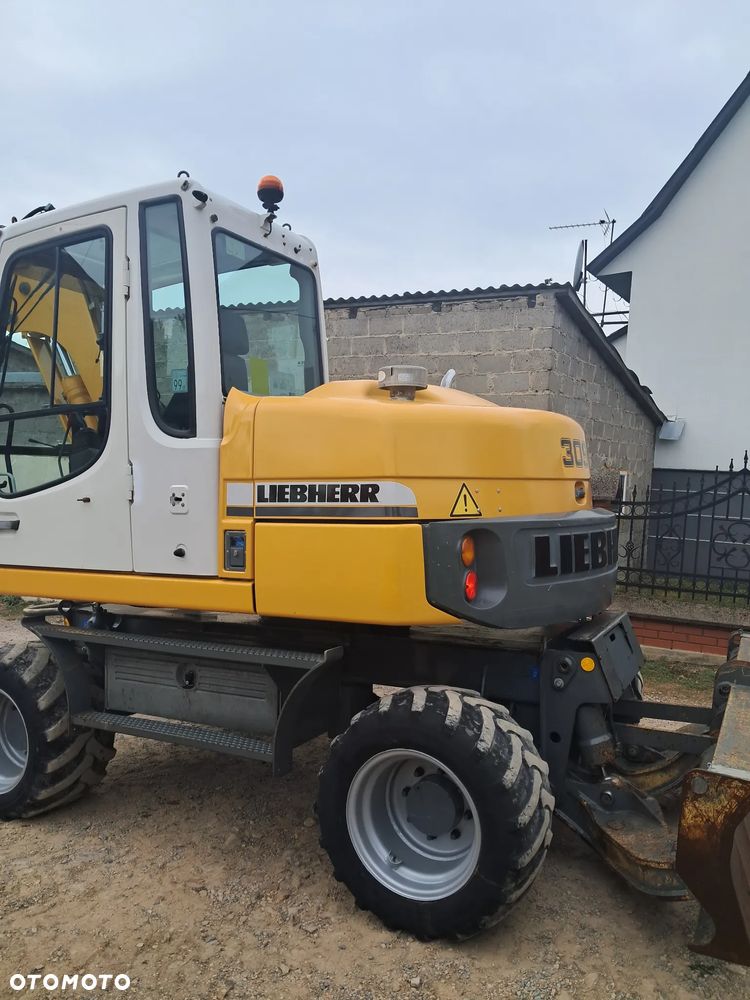 Liebherr 309 Litronic - 8
