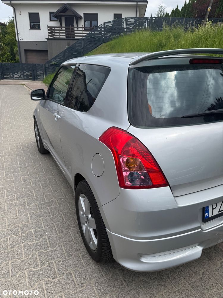Suzuki Swift 1.3 Club - 7