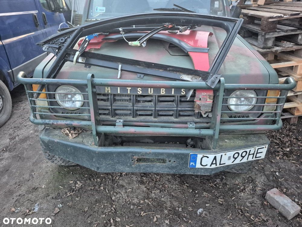 Zderzak metalowy mitsubishi pajero I orurowanie kangur oslona lamp