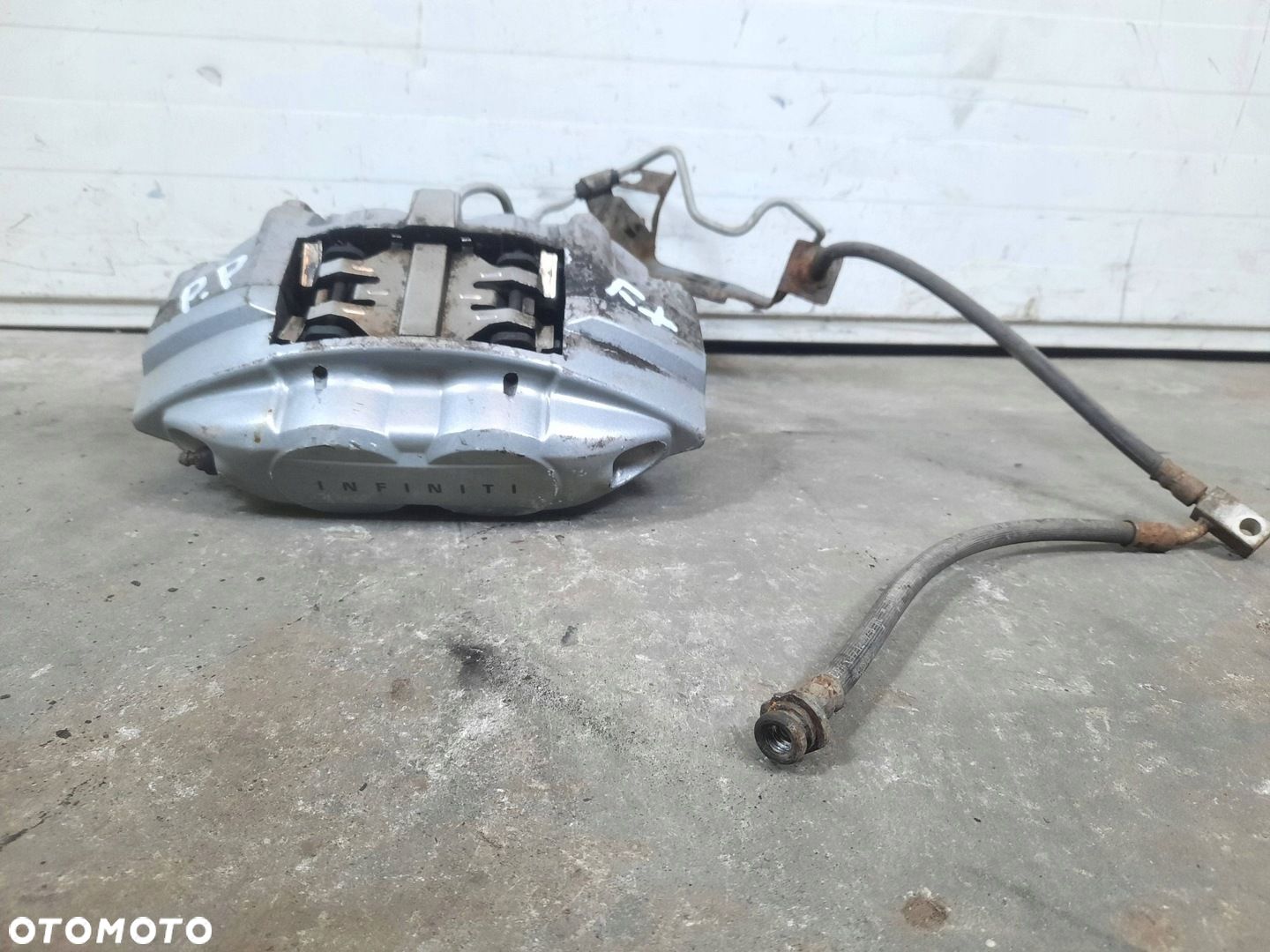 ZACISK HAMULCOWY PRAWY PRZÓD PRZEDNI INFINITI FX 30 II LIFT QX70 3.0D - 1