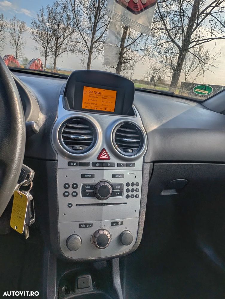 Opel Corsa 1.4 16V Active - 12