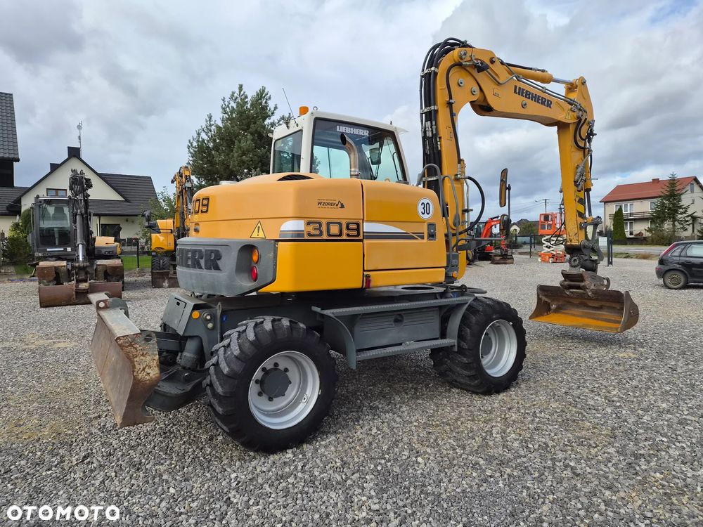 Liebherr A 309 Litronic - 3