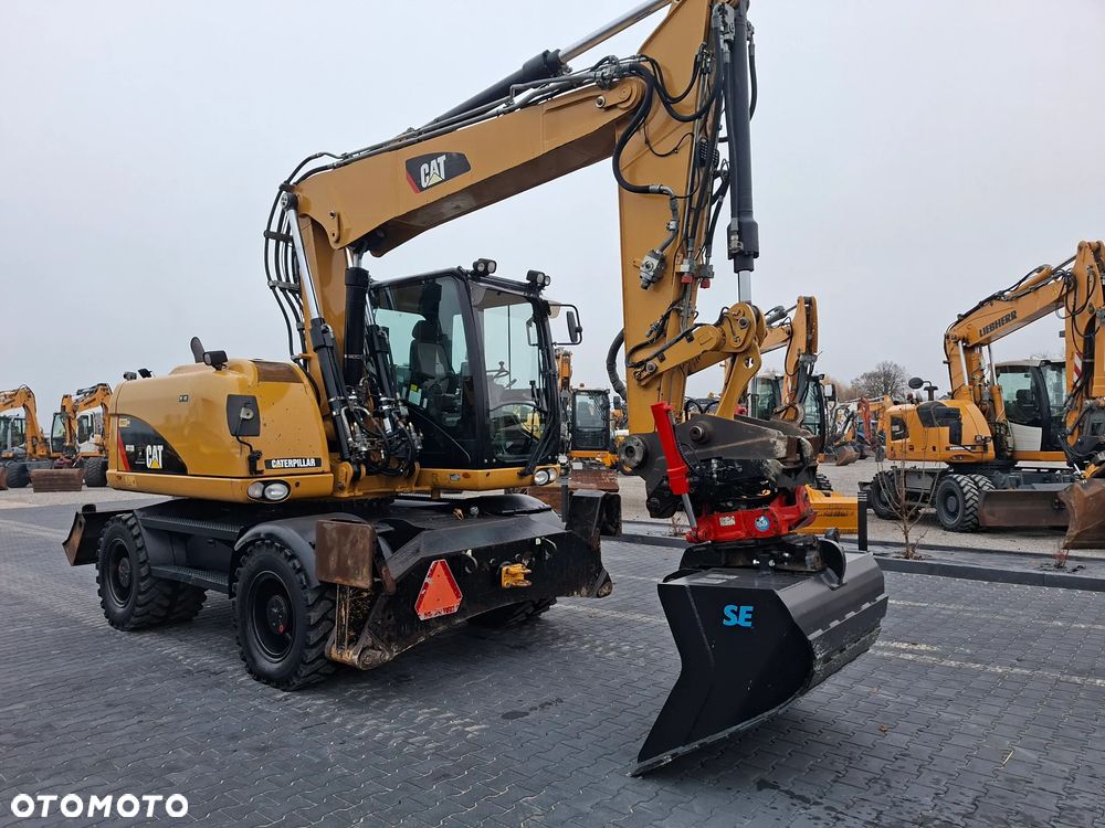 Caterpillar CAT M313D ROTOTILT - 1